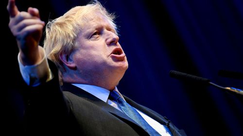 Former foreign secretary Boris Johnson puts pressure on Prime Minister Theresa May at the Conservative Party conference.