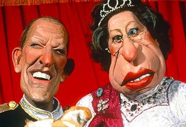 When did Spitting Image debut on UK television?