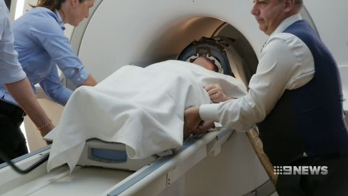 an MRI-guided Focussed Ultrasound pinpoints an area in the brain called the thalamus and creates a tiny lesion under heat to stop tremors.