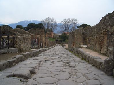 destroyed in 79 AD by the volcanic eruption of Mount Vesuvius near present-day Naples, Italy.