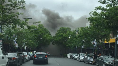 Thick black smoke is filling the sky in Liverpool with Fire and Rescue NSW attending. (9NEWS)