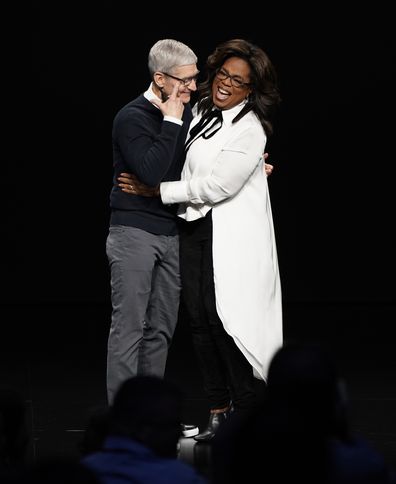 Tim Cook and Oprah Winfrey