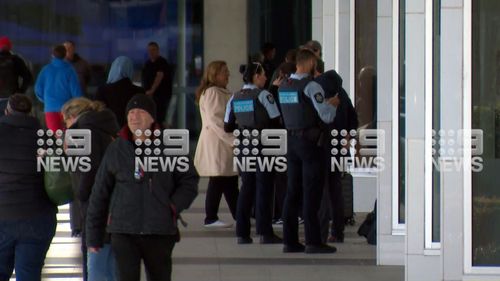 Police at Canberra Airport following a shooting