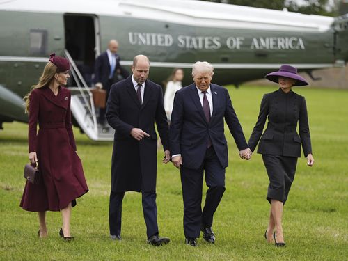 Prince William and Kate, Princess of Wales, left, receive President Donald Trump and first lady Melania Trump