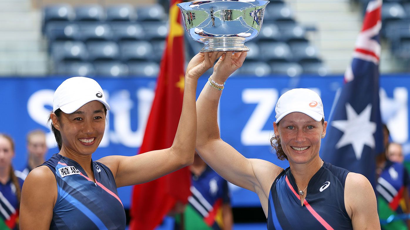  Shuai Zhang of China and Samantha Stosur of Australia celebrate with the championship trophy after defeating Coco Gauff of the United States and Catherine McNally of the United States during their Women&#x27;s Doubles final match on Day Fourteen of the 2021 US Open at the USTA Billie Jean King National Tennis Center on September 12, 2021 in the Flushing neighborhood of the Queens borough of New York City. (Photo by Al Bello/Getty Images)