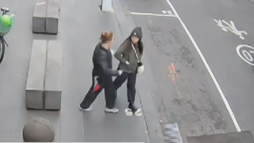 CCTV footage has shown the moment a woman was randomly stabbed in broad daylight while walking to work at a sushi restaurant in Melbourne's CBD. ﻿