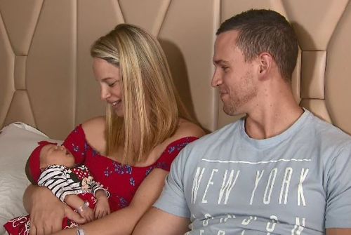 Georgie is the couple's third child and is healthy. (9NEWS)