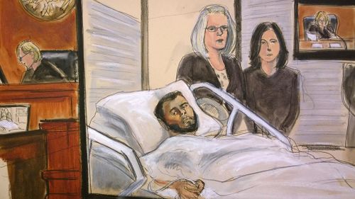 In this courtroom sketch, defendant Akayed Ullah is seen on a video monitor from his hospital room, joined by his attorneys. (AAP)