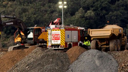 Heavy earth moving machinery and vehicles are gathered at the site as the excavation works to rescue two-years old boy Julen, trapped inside a well since January 13 in Malaga.