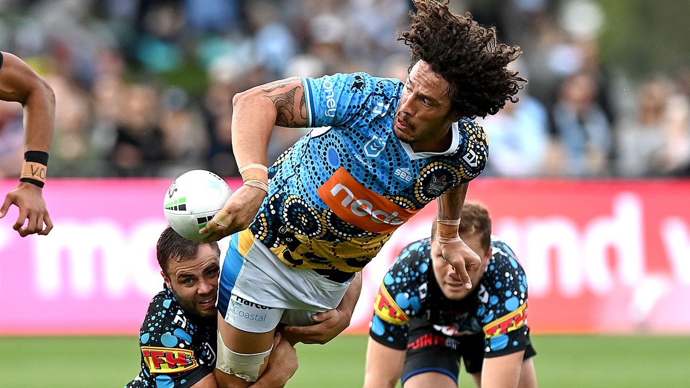 Kevin Proctor of the Titans offloads during the round 12 NRL match between the Cronulla Sharks and the Gold Coast Titans at C.ex Coffs International Stadium, on May 30, 2021, in Coffs Harbour, Australia. (Photo by Bradley Kanaris/Getty Images)
