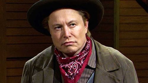 Elon Musk, seen here dressed as a cowboy on Saturday Night Live, said he expects his staff to be in the office a minimum of 40 hours a week.