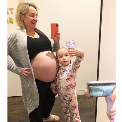 Fifi Box pregnant selfie with daughter Trixie