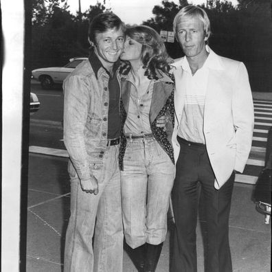 Super Ocker Paul Hogan (Right) and his producer John Cornell arrived back in Sydney today after a five week "cultural exchange" tour of the US. In the States they taped a television special titled Paul Hogan Pays Back Glen Campbell.  The program will star Telly Savalas, The captain and Tenille and Rod Stewart.  At Sydney Airport, Hogan and Cornell were met by Delvene Delaney who will co-star in the Special. November 16, 1976.