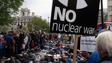 Anti-nuclear activists outside Westminster Abbey where they staged a 'die in' to protest against nuclear weapons.