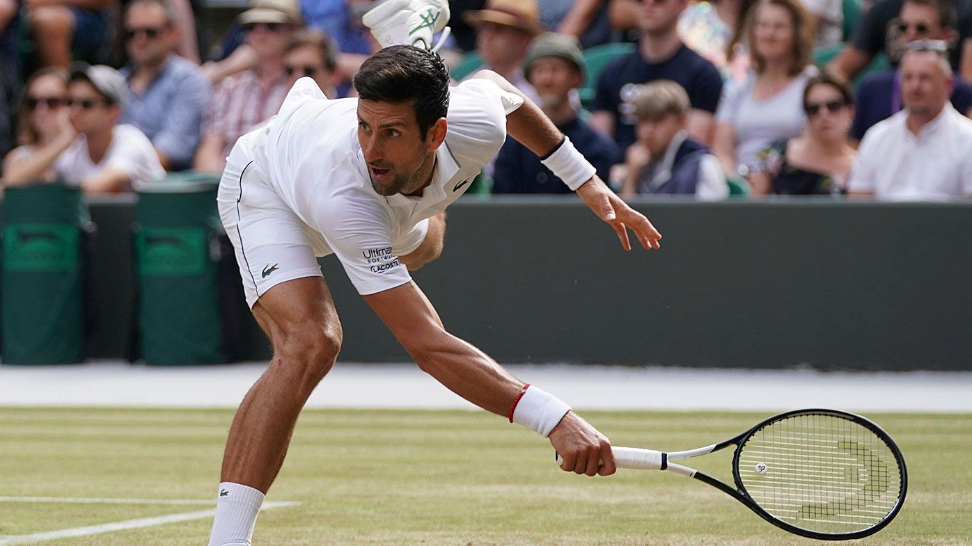 Djokovic hits a ball during the Men's singles third round 