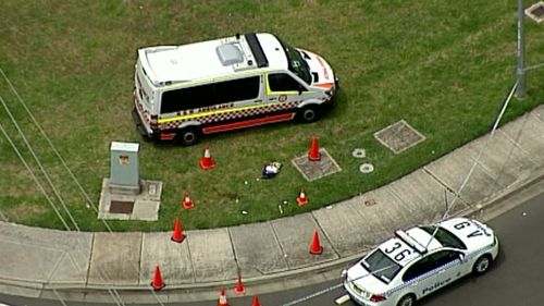 Police have cordoned off the area where a woman died in West Hoxton. (9NEWS)