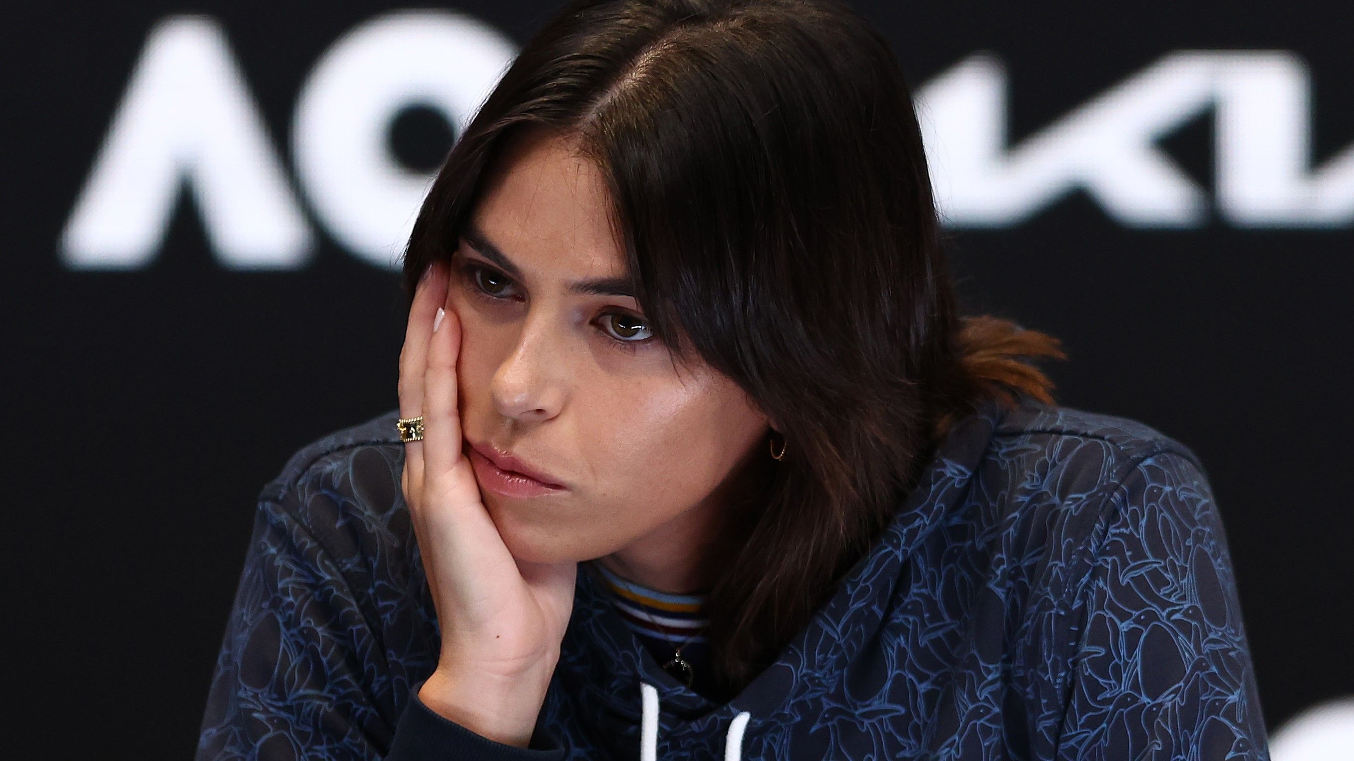 A teary Ajla Tomljanovic speaks to the media during a press conference after pulling out of the 2023 Australian Open.