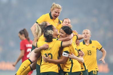 The Matildas celebrate scoring a goal with teammates during the International Friendly Match against Canada at Allianz Stadium on September 6, 2022 in Sydney.