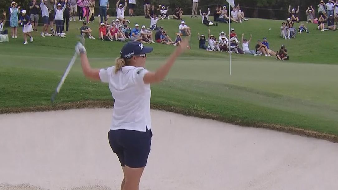 Ashleigh Buhai celebrates her hole out from the bunker at the fourth hole.