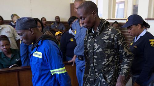 South African 'cannibal case' men get life sentences.