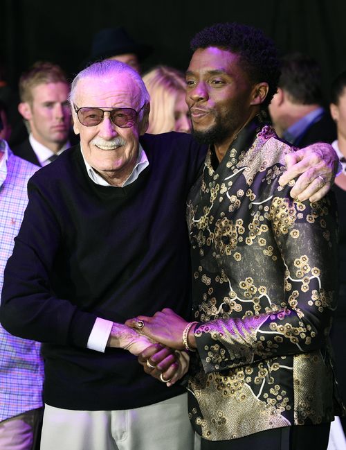 Stan Lee, left, creator of the Black Panther superhero character, poses with Chadwick Boseman, the star of the Black Panther film. (AAP)