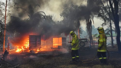 Buildings and property were lost as bushfires raced through Failford on the Mid North Coast. Hillville Fire.