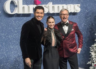 Henry Golding, Paul Feig and Emilia Clarke at the UK premiere of Last Christmas on November 11.