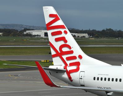 A Boeing 737-800 is seen at the Virgin Australia Airlines terminal at Adelaide Airport in Adelaide.