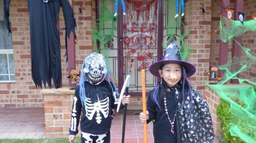 A witch and skeleton made a haunted a home in Glenwood. (Supplied by Natasha and Aidan Bow)