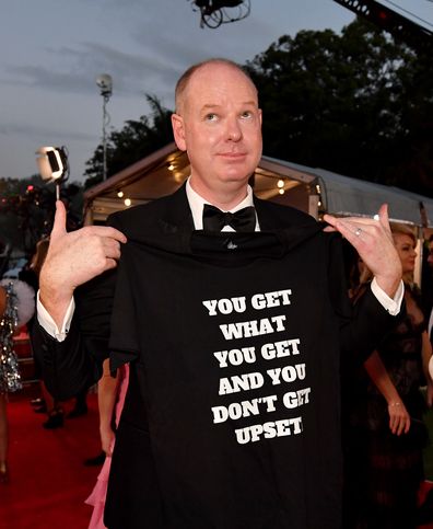 Tom Gleeson is seen posing for a photograph on the red carpet at the 2019 TV Week Logie Awards
