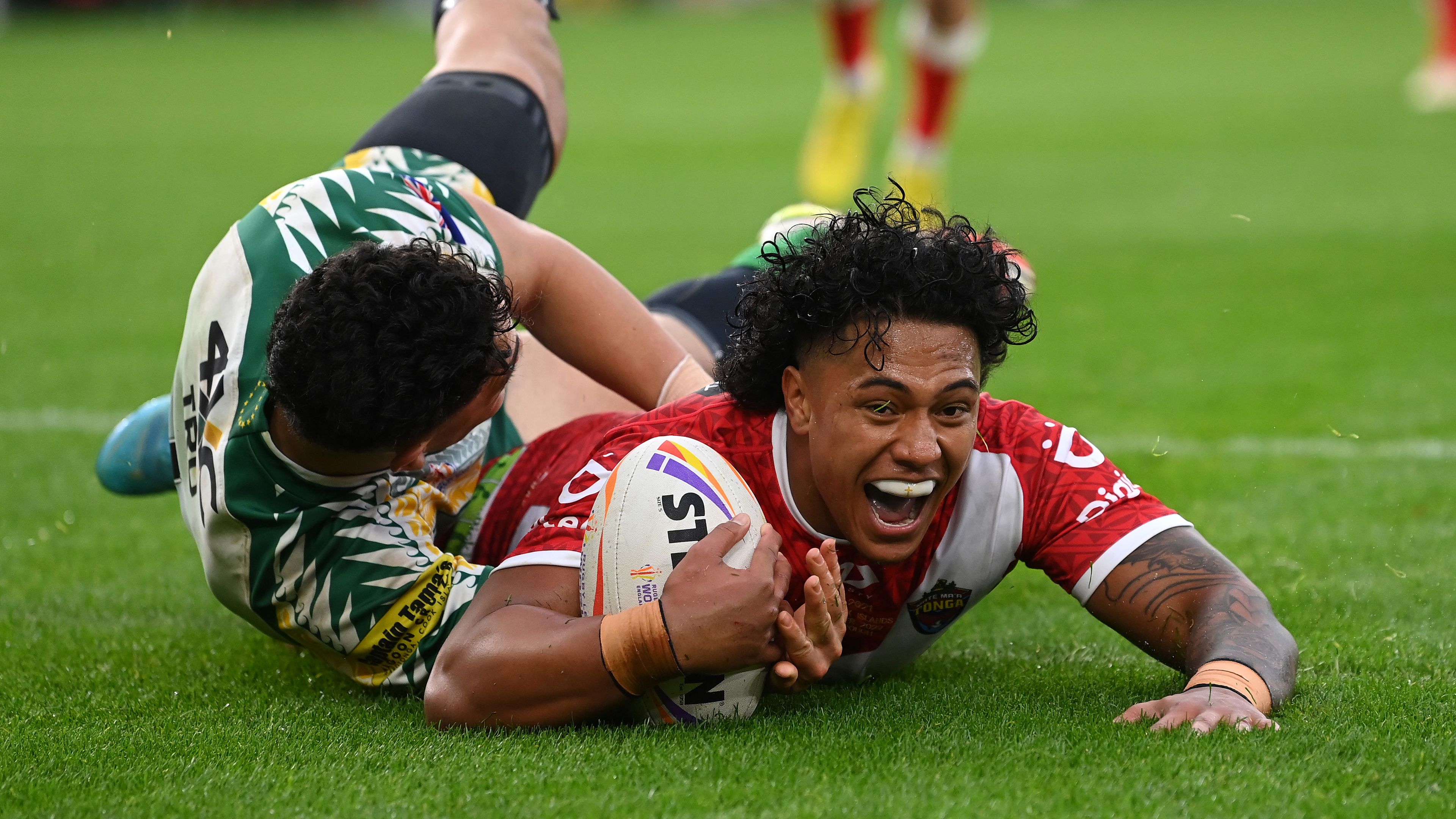 Tesi Niu of Tonga goes over to score their sides tenth try during Rugby League World Cup 2021 Pool D match between Tonga and Cook Islands at Riverside Stadium on October 30, 2022 in Middlesbrough, England. (Photo by Stu Forster/Getty Images)