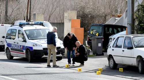 Three people are dead after a gunman took hostages at the supermarket. (AP/AAP)