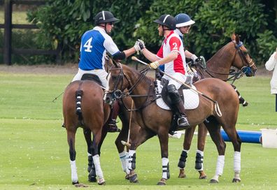 Prince William, Duke of Cambridge and Prince Harry, Duke of Sussex play during The King Power Royal Charity Polo Day at Billingbear Polo Club on July 10, 2019 in Wokingham, England.