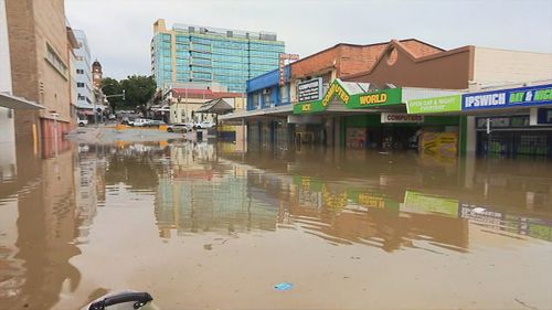Businesses have been swallowed by floods in Ipswich, Queensland.
