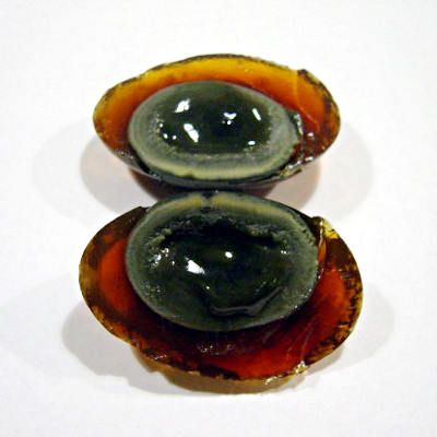 Known by many names, including hundred-year/thousand-year/millennium egg, a century egg is a preserved chicken, duck or quail egg. The eggs are packed in a mix of clay, lime, salt and ash and left to sit for three years or more.