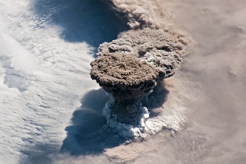 Out-of-this-world photos show plumes of smoke and debris from a volcano near Japan erupting into the atmosphere.