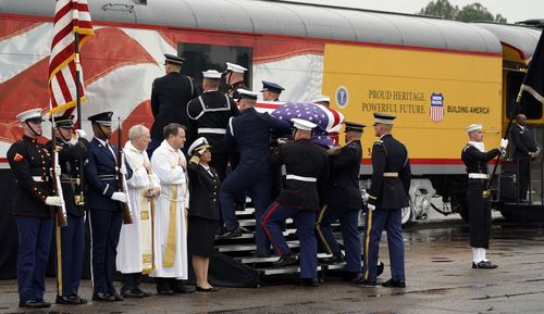 Following the services, a special funeral train was carrying Bush's remains through small towns to the family plot on the presidential library grounds at Texas A&amp;M University in College Station.