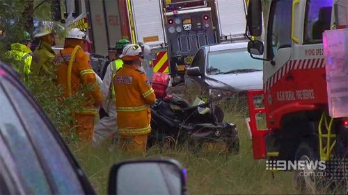 Emergency services at the scene of the smash. (9NEWS)