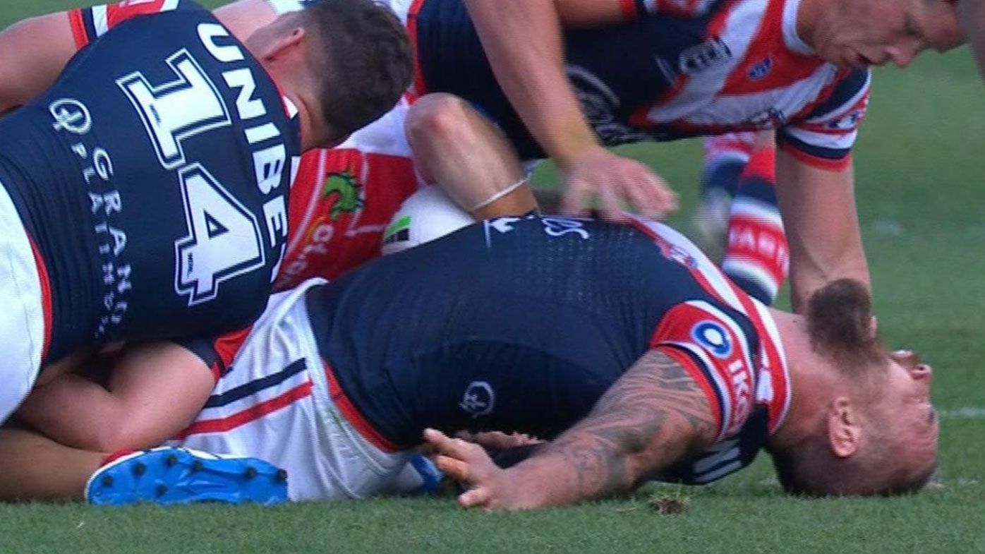 JWH somehow escapes injury after horror tackle