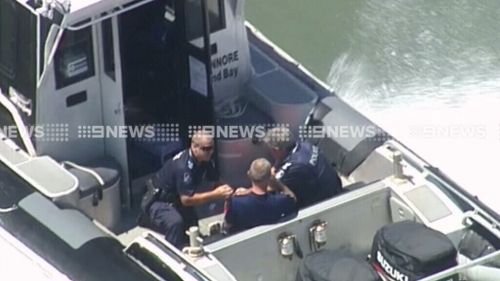 One person was pulled from the water and treated by paramedics. (9NEWS)
