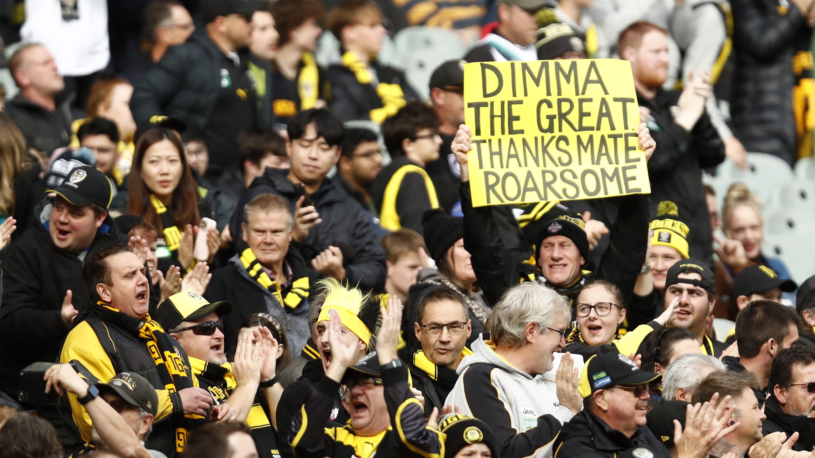 Richmond fans pay tribute to Damien Hardwick during the round 11 AFL match between Richmond Tigers and Yartapuulti / Port Adelaide Power at Melbourne Cricket Ground, on May 28, 2023, in Melbourne, Australia. (Photo by Darrian Traynor/AFL Photos/via Getty Images)