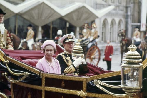 FILE - Britain's Queen Elizabeth II and Prince Philip, the Duke of Edinburgh travel in a carriage during celebrations for the Silver Jubilee in London, June 7 1977. Queen Elizabeth II, Britains longest-reigning monarch and a rock of stability across much of a turbulent century, has died. She was 96. Buckingham Palace made the announcement in a statement on Thursday Sept. 8, 2022 (AP Photo, File)