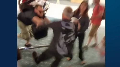 Heated argument continues outside airport terminal (ABC AMERICA)