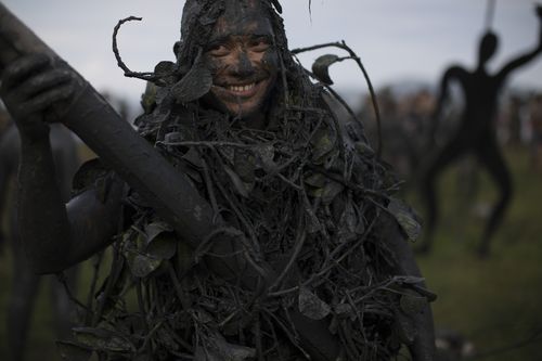 The Mud Party is held annually in the coastal town of Paraty, Brazil. (AP)