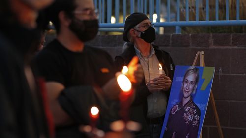 New Mexico residents attend a candlelight vigil to honor cinematographer Halyna Hutchins. 