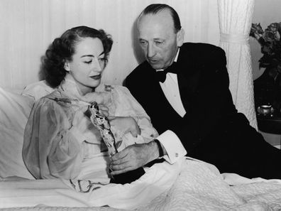 Joan Crawford accepts her Oscar in bed.