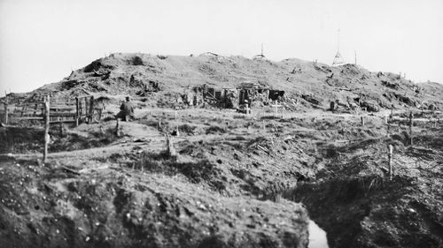 A view of the Butte, near Polygon Wood, Ypres. A number of graves of Australian soldiers can be seen in the foreground. (AAP/ supplied by Australian War Memorial)