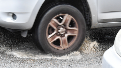 After all the rain, Sydney roads are covered in pot holes. Cars swerve to miss a pothole in York Road, Queens Park. Photo Peter Rae. Thursday 21 July, 2022