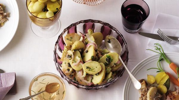 Warm potato salad with celery, red onion and capers