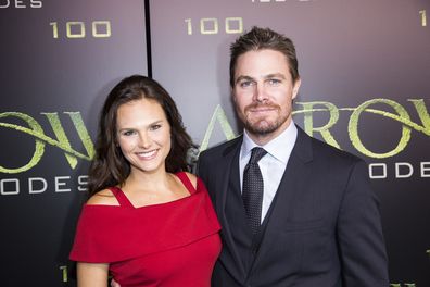 Actors Cassandra Jean and Stephen Amell arrive on the green carpet for the Celebration of the 100th Episode of CW's "Arrow" at the Fairmont Pacific Rim Hotel on Oct 22, 2016 in Vancouver, BC, Canada. 